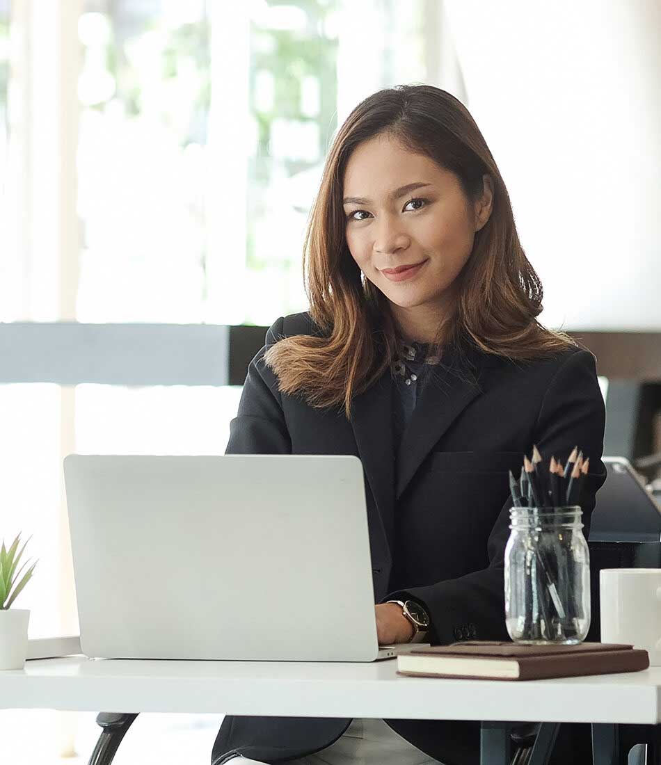 Woman using laptop with Smart Wi-Fi